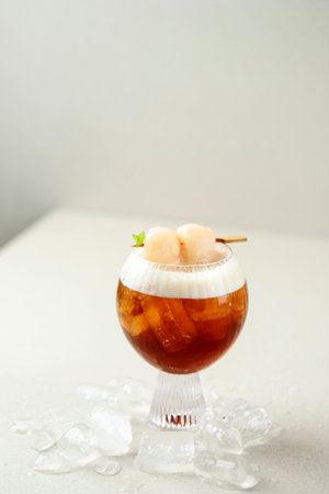 Homemade Ice Lychee Tea with Canned Litchi. Copy Space for Text, Summer Drink Concpet.