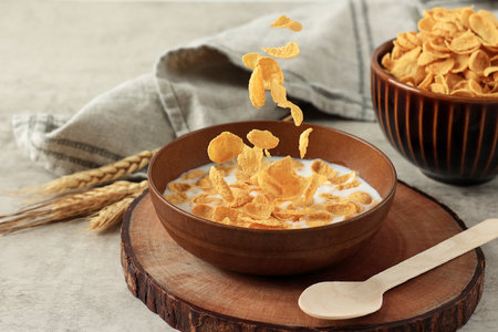 Cornflakes in Brown Bowl with Milk, Breakfast Food and Snack for Healthy Food Concept, Morning...