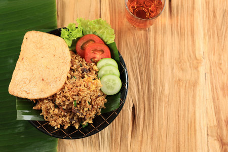 Top View Nasi Goreng Rendang with Shrimp Cracker, Rendang is Traditional Melayu Minang Beef Stew. Copy Space for Textの写真素材