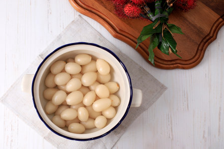 Top View Peeled Rambutan in Ceramic Bowlの写真素材