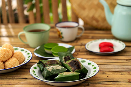 Lemper Bakar, Grilled Indonesian Rice Cake with Shredded Chicken Inside. Made frrom Sticky Rice with banana Leaf Wrapの写真素材