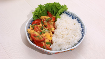 Stir Fry Tomato Egg with White Riceの写真素材