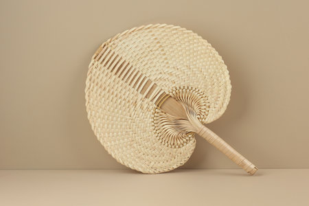 Woven Rattan Fan, Traditional Asian Fan Made from Weave Palm Leave, Bambo or Rattan. Eco Friendly Conceptの写真素材