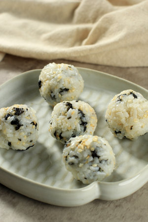 Korean Seaweed Rice Balls or Jumeokbap with Ham, Sausage, Sesame Seed, Sesame Oil, and Vegetableの写真素材