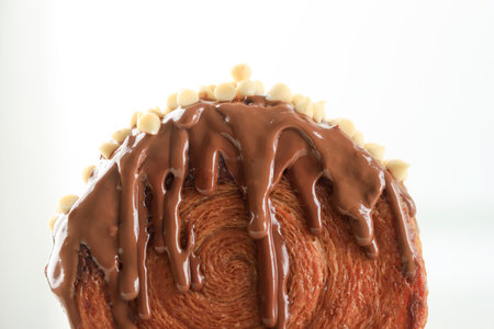 Close Up Croissant Bomboloni or Cromboloni with melted Chocolate and White Chocolate Chips, Isolated...