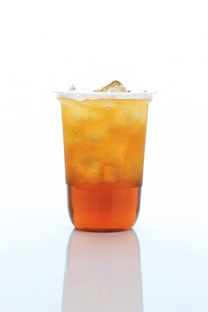 Ice Tea on Disposable PLastic Cup, Isolated on Whiteの写真素材