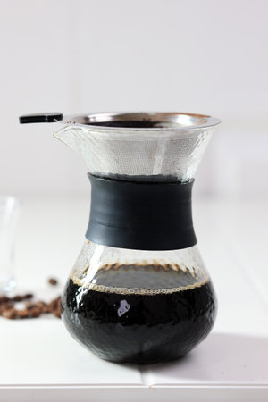 V60 Pour Over Manual Coffee Maker on White Table