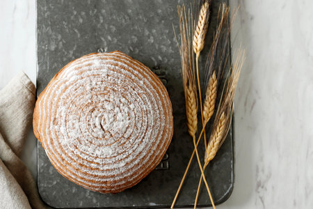 Top view of Homemade Boule Shaped Freshly Baked Sourdough Bread