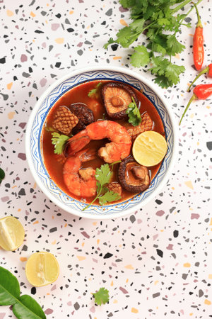 Top View Tom Yang Kung Seafood Prawn Thai Soup with Lime and Lemongrassの写真素材