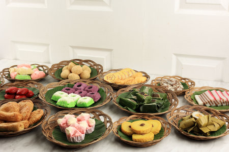 Jajan Pasar Festive Various Colorful Indonesia Traditional Food Served on Woven Plateの写真素材