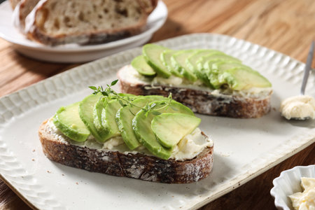 Open Sourdough Sandwich with Cream Cheese and Sliced Avocado, Close Up