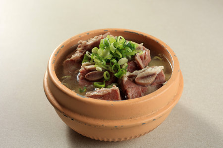 Galbitang, Korean Short Rib Soup with Green Onion Topping. Served on Stone Dolsotの写真素材