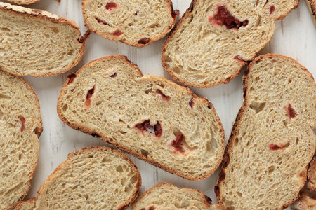 Top View Cranberry Bread Sourdough Texture on White Wooden Table