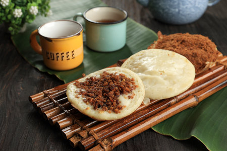 Surabi Oncom, Indonesian Traditional Pancake with Oncom Fermented Soybean. Served with Teh Tawar
