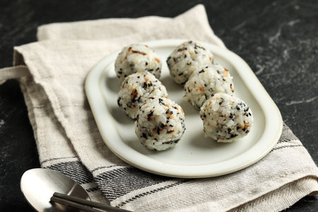 Korean Seaweed Rice Balls or Jumeokbap with Sesame Seed, Sesame Oil, and Vegetableの写真素材