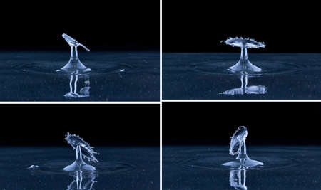Splash and umbrella on black background. Reflection on the surface of the water.の写真素材