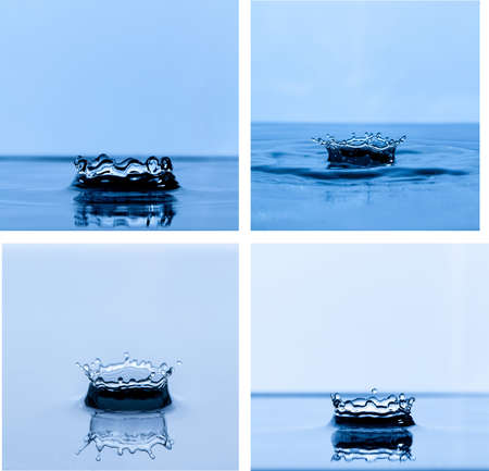 Splash and crown on white background. Reflection on the surface of the water.の写真素材