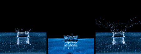 Splash and crown on black background. Reflection on the surface of the water.の写真素材
