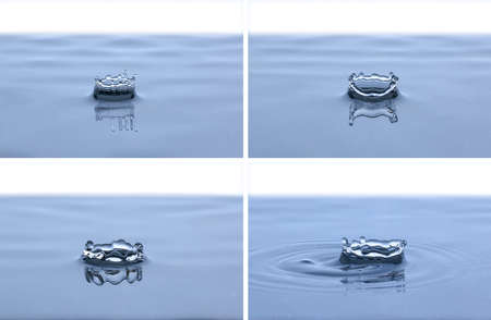 Splash and crown on white background. Reflection on the surface of the water.の写真素材