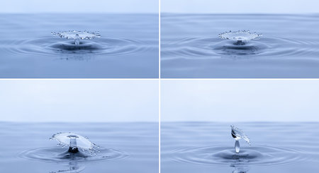 Splash and umbrella on white background. Reflection on the surface of the water.の写真素材