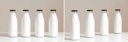 Packaging for dairy products, glass bottles for milk isolated on white background. Unmarked bottles filled with milk.の写真素材