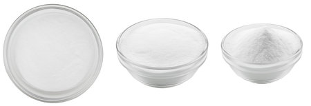 Soda in a glass bowl. Soda, flour, salt or sugar in a glass container. Three different angles of a plate with soda, flour, salt or sugar on a white background.の写真素材