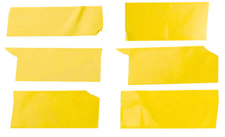 Yellow glossy paper. A set of torn horizontal and paper ribbons of various sizes isolated on a white background.の写真素材