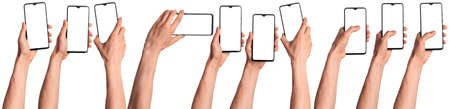 A man holds in his hands a blank black smartphone screen with a modern frameless design. Ten positions isolated on white backgroundの写真素材