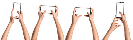 A girl holds in his hands a blank black smartphone screen with a modern frameless design. Four positions isolated on white backgroundの写真素材