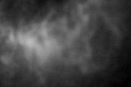 Sprayed water. Small droplets of water in the air. Lots of water drops, isolated on black background.の写真素材