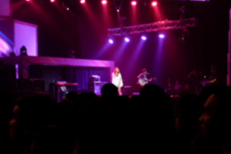 Blurred background : Bokeh lighting in indoor concert.