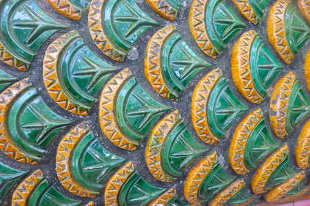 close up of scaly serpent background, the art of Thai temple.の写真素材
