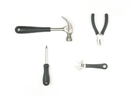 Set of tools for repair and construction : hammer, wrench, pliers and screwdriver