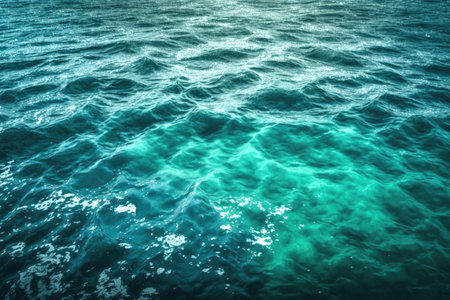 Turquoise sea viewed from above, crystal clear water inviting to dive in and explore the underwater worldの写真素材