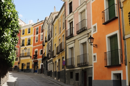 Colorful facades of the houses in the main street of the old town of Cuenca, Spain. のeditorial素材