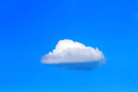 Blue sky single cloudの写真素材