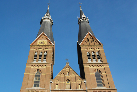 Church in Amsterdam against blue skyの写真素材