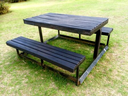 Wooden Bench and Table in a rural african resort. This is from hawane resort of Eswatini (Swaziland)の写真素材
