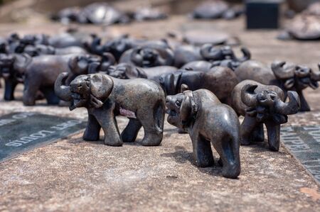 Wild animal replicas crafted from soft stone in africaの写真素材