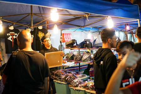 JOHOR,MALAYSIA - FEBRUARY 2019 : Street scene of massivepeople at Pasar Karat or car boot sale...