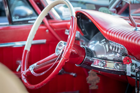 Steering wheel and dashboard of a vintage car, close-upの写真素材