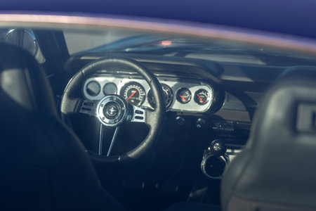 Steering wheel and dashboard of a vintage car, close-upの写真素材