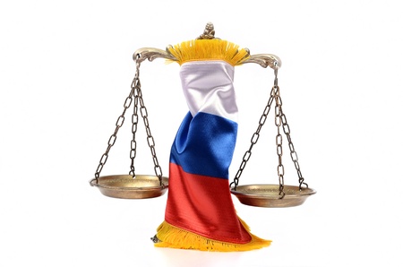Scales of Justice and Russian Federation flag on the white background, concept of law in Russian Federationの写真素材