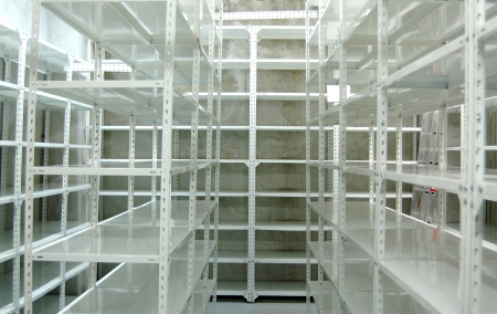 Empty warehouse racks, Empty metal shelf in storage room, storage conceptの写真素材
