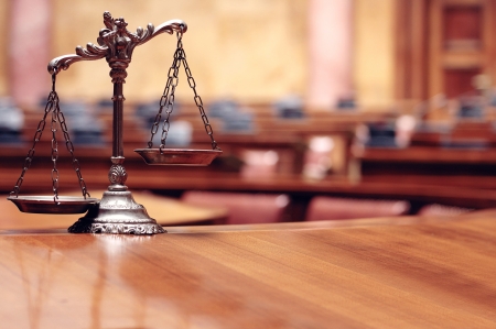Symbol of law and justice in the empty courtroom, law and justice concept の写真素材