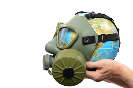 Global Earth and environmental pollution concept, Globe with gas mask isolatedの写真素材