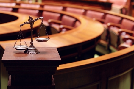Symbol of law and justice in the empty courtroom, law and justice concept の写真素材