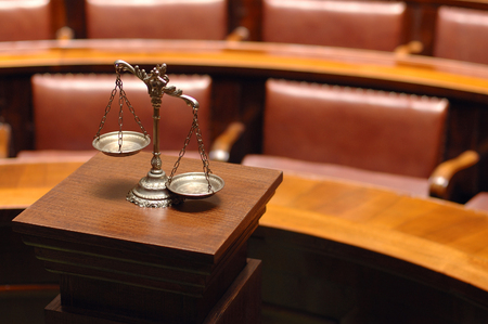 Symbol of law and justice in the empty courtroom, law and justice concept.の写真素材