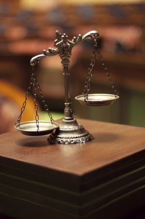 Symbol of law and justice in the empty courtroom, law and justice concept.の写真素材