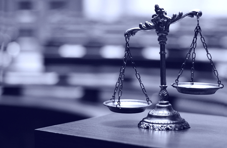 Symbol of law and justice in the empty courtroom, law and justice concept.の写真素材